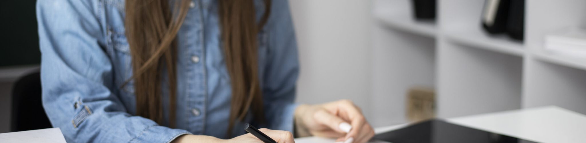 smiley-woman-taking-notes-indoors